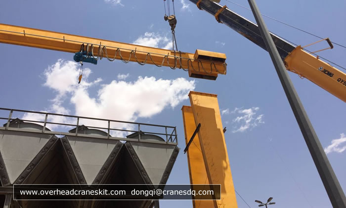 Install gantry crane main girder on the legs